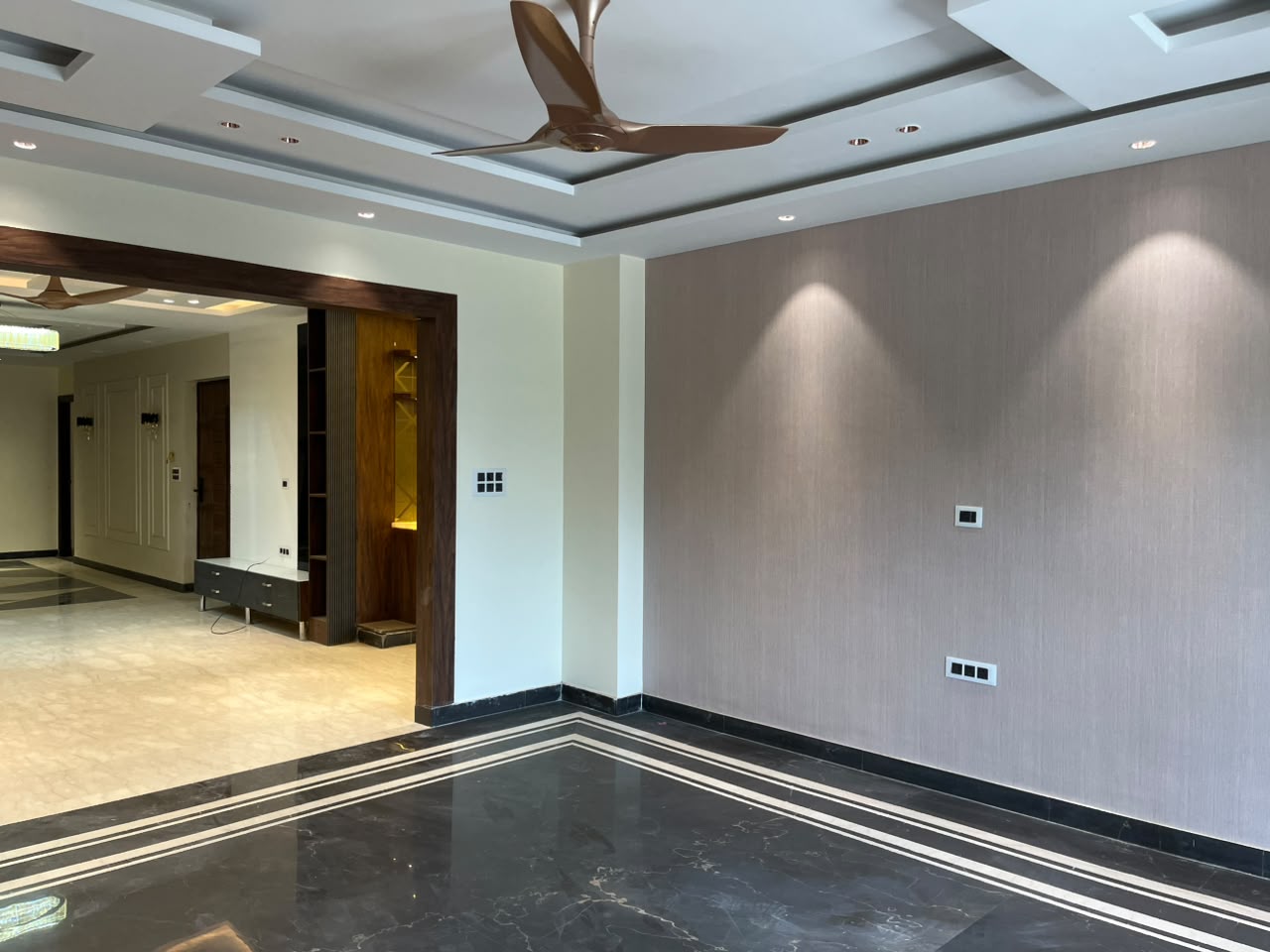 Designer interiors dark marble flooring